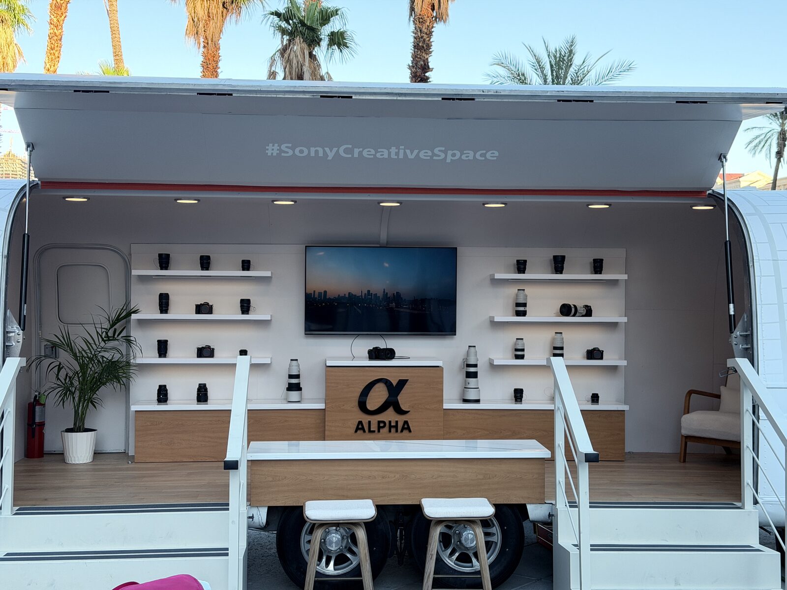 Mobile event trailer set up outdoors for on-site merch printing
